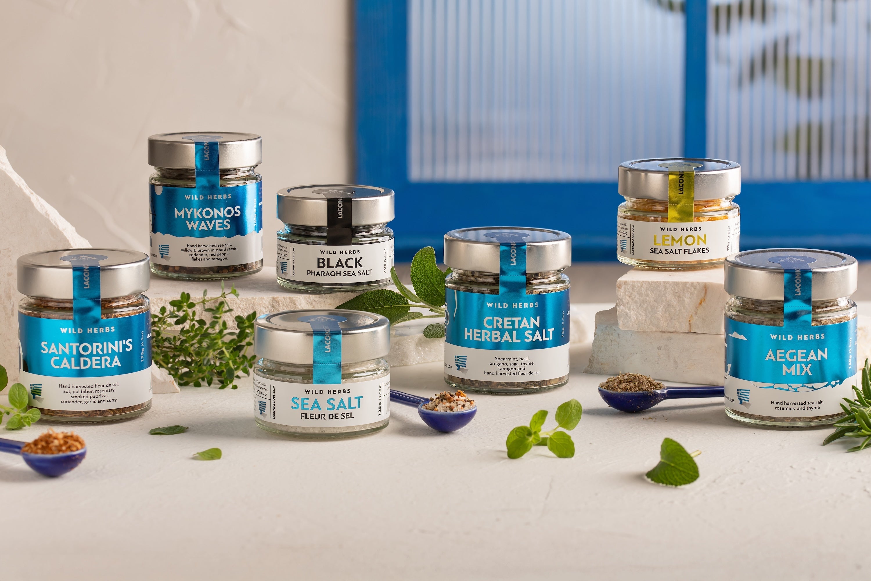Greek sea salt and herb spice blends from Laconic Foods, including Santoriniβs Caldera, Mykonos Waves, Cretan Herbal Salt, and flavored salts like lemon and black salt.