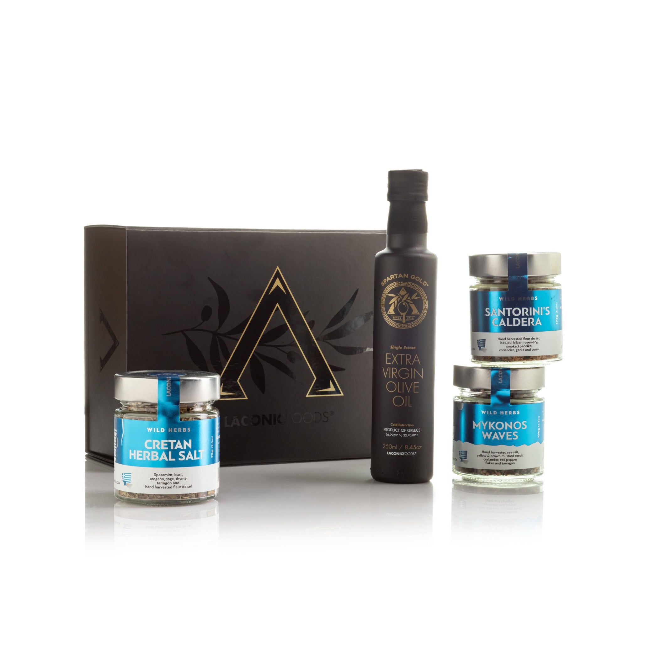 Laconic Foods gift set with extra virgin olive oil and three Greek herb and spice blends, displayed with premium black and gold gift box.