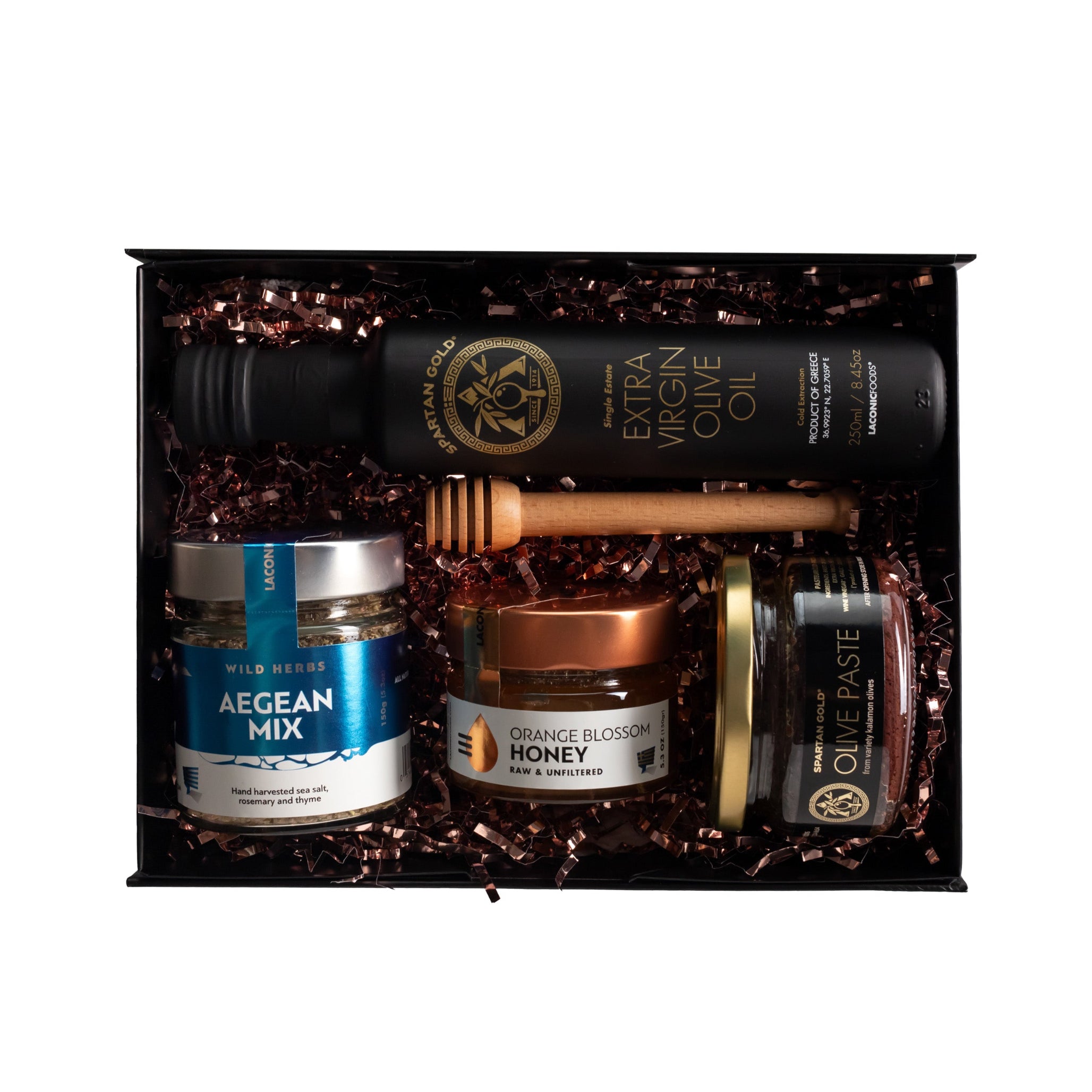 Laconic Foods Greek gift box with extra virgin olive oil, raw honey, olive paste, Aegean spice blend, and wooden honey dipper in luxury packaging