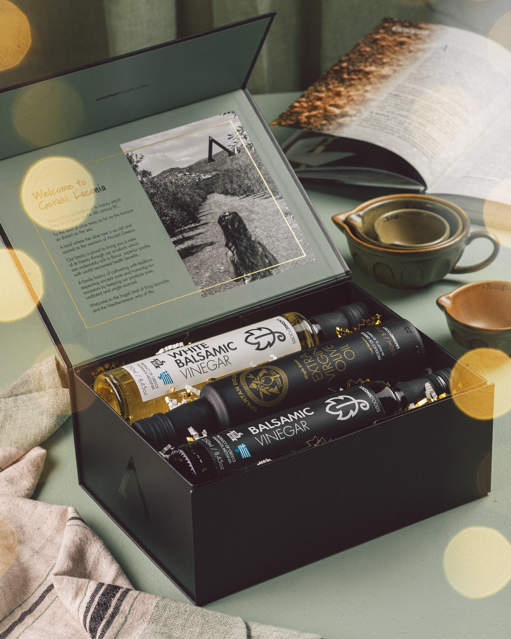 Premium Laconic Foods Greek Olive Oil & Vinegar Gift Set displayed in elegant holiday kitchen scene