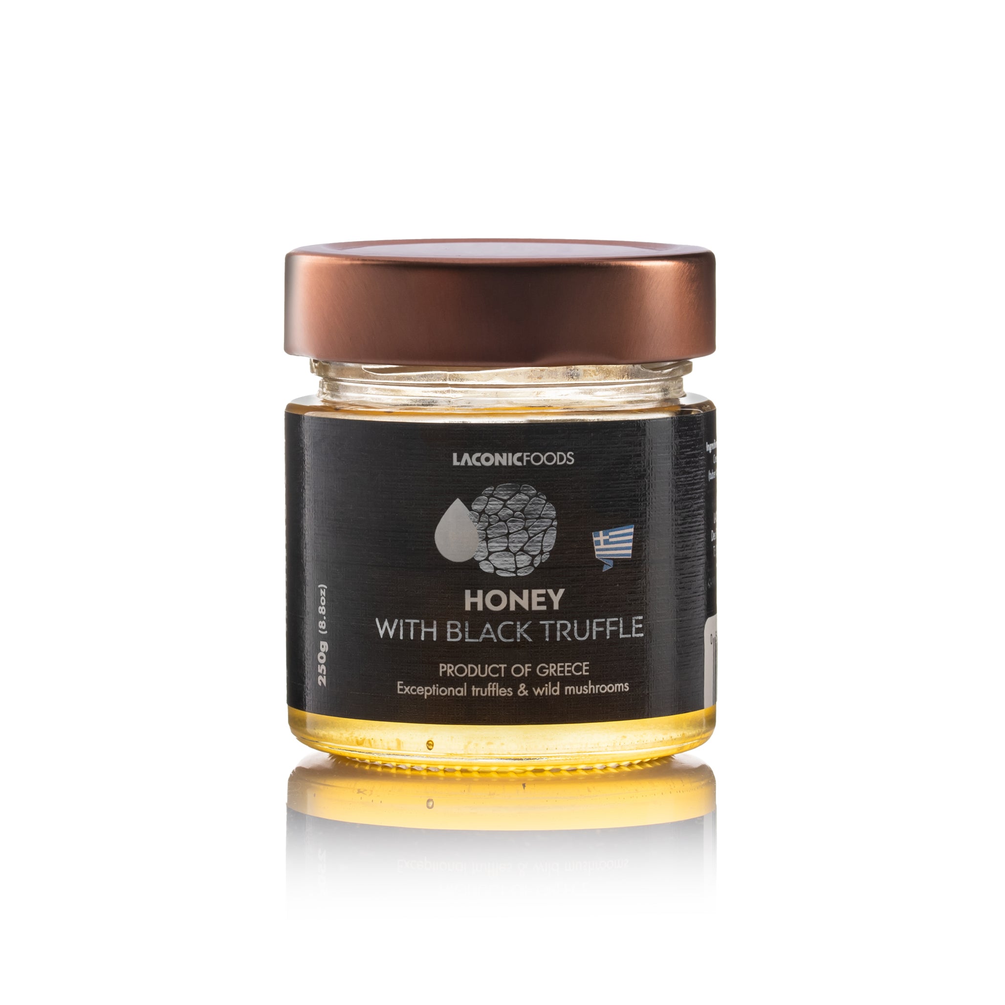 Front view of Laconic Foods Honey with Black Truffle 250g jar – premium Greek honey infused with black summer truffle, shown with elegant label and reflection.