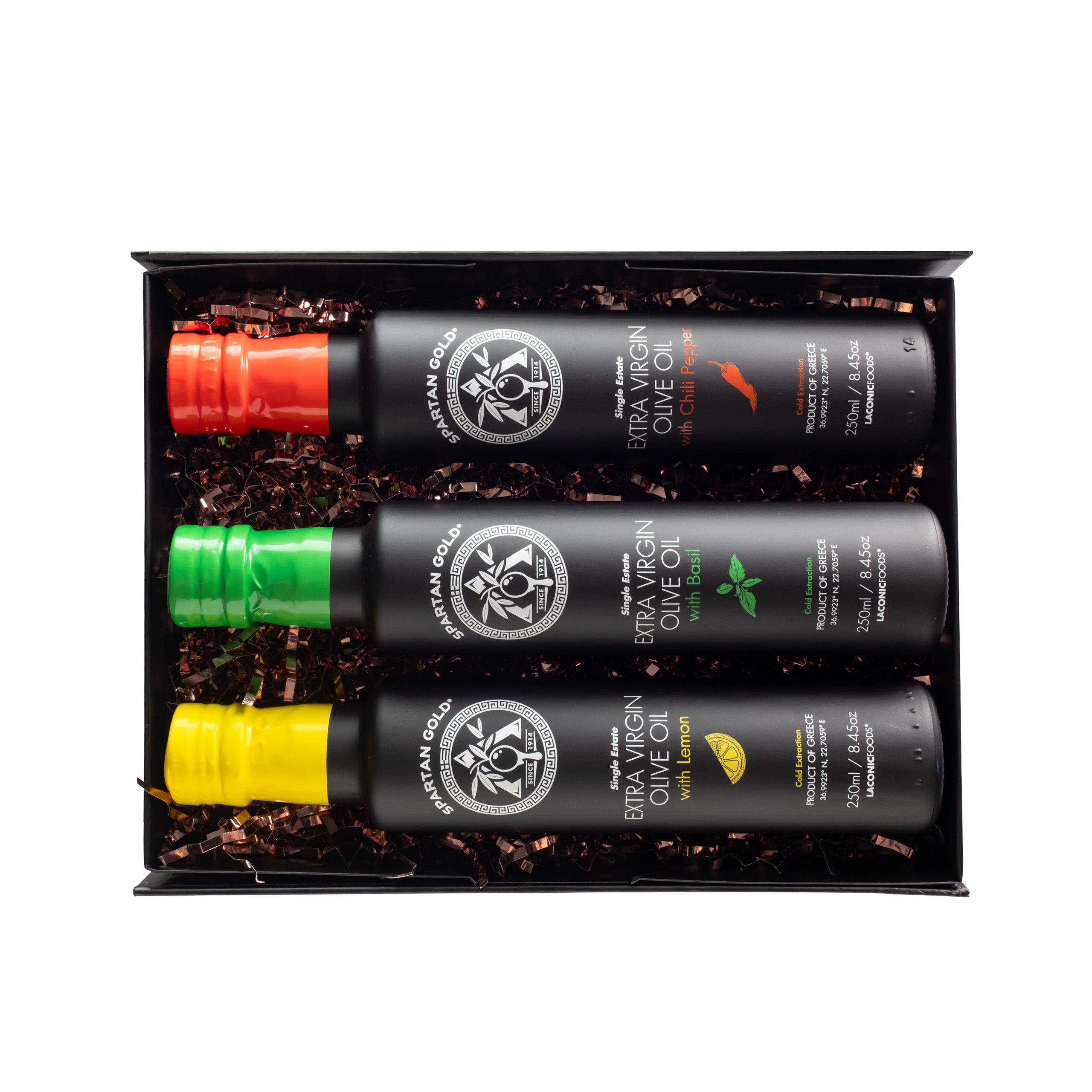 Top view of Laconic Foods Infused Olive Oil Trio Gift Box showing three bottles in protective packaging.