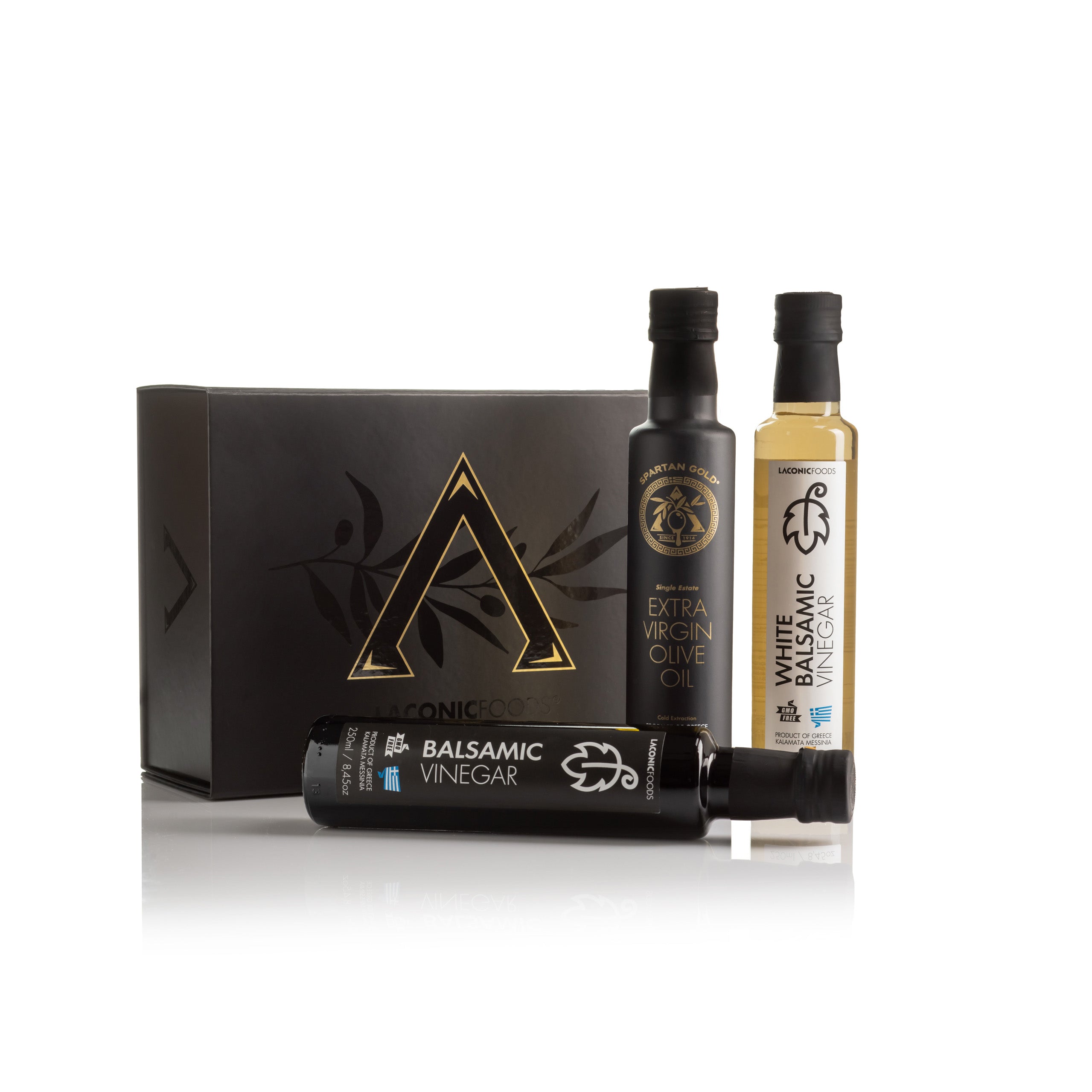 White Balsamic Vinegar, Balsamic Vinegar, and Extra Virgin Olive Oil bottles with premium Laconic Foods gift box