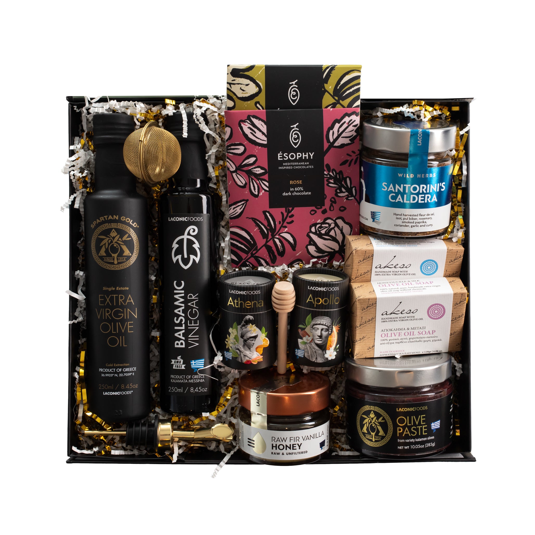 Top view of Laconic Foods premium Greek gift box featuring EVOO, vinegar, raw honey, teas, chocolates, olive paste, soaps, spice blend, and gift accessories