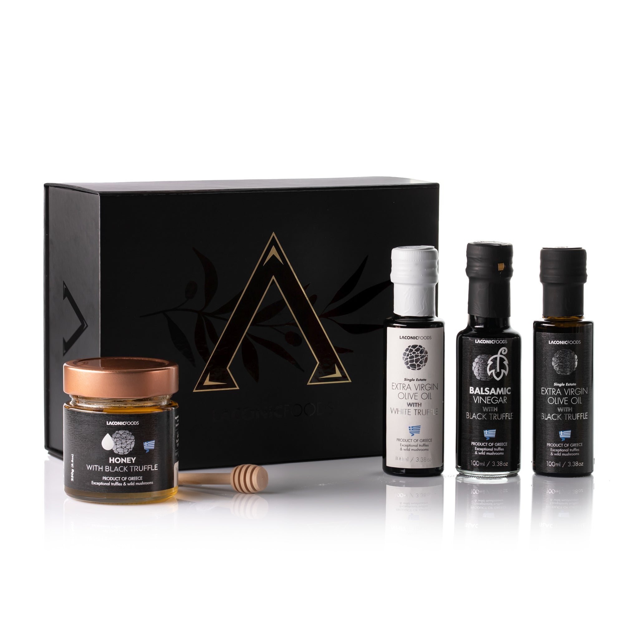 Laconic Foods Truffle Collection Gift Box featuring truffle honey, truffle olive oils, balsamic vinegar, and black presentation box with gold logo.