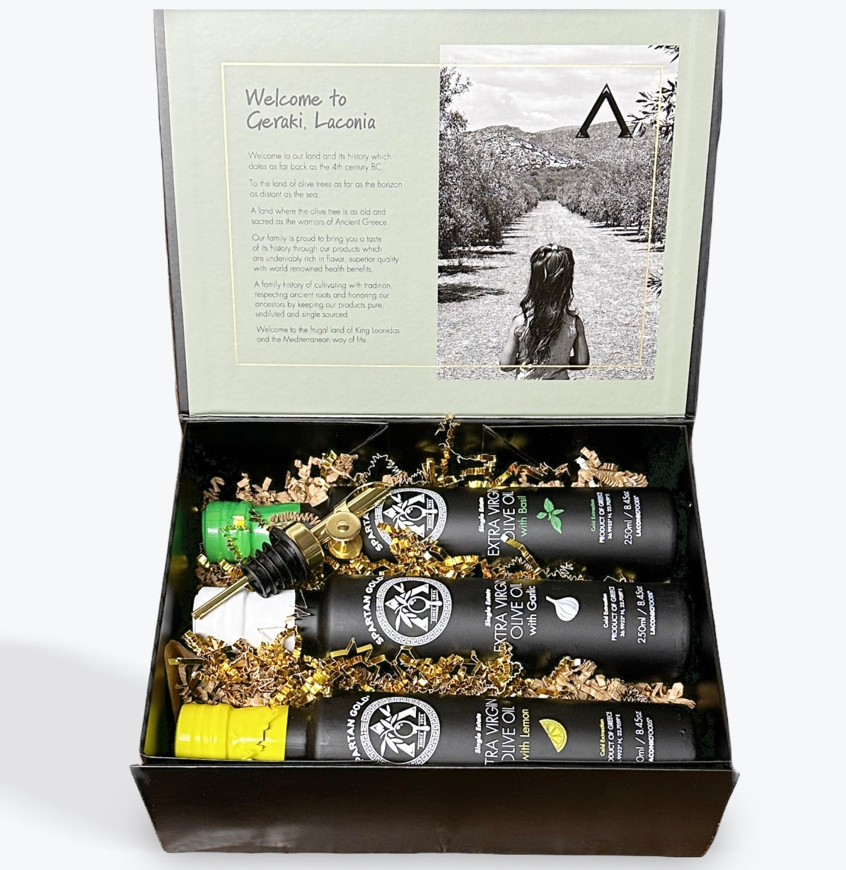Laconic Foods Gift Box with Basil, Garlic, and Lemon infused extra virgin olive oils in open packaging.