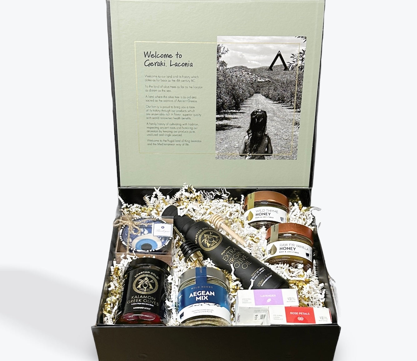 Open Premium Greek Gift Box featuring EVOO, Kalamata olives, raw honey, handmade soaps, Aegean spice mix, dipping dish, and olive oil pourer