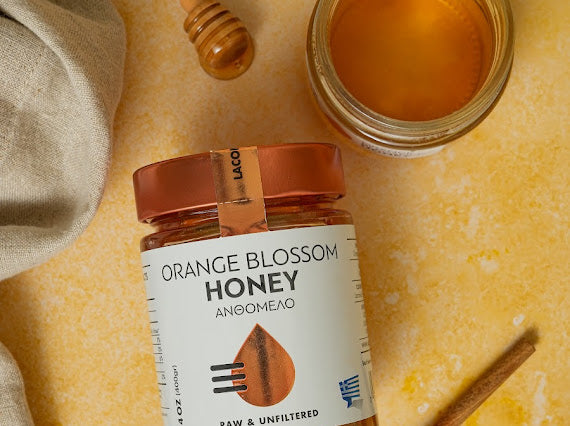 Unfiltered Greek Orange Blossom Honey β Overhead Jar with Warm Tones