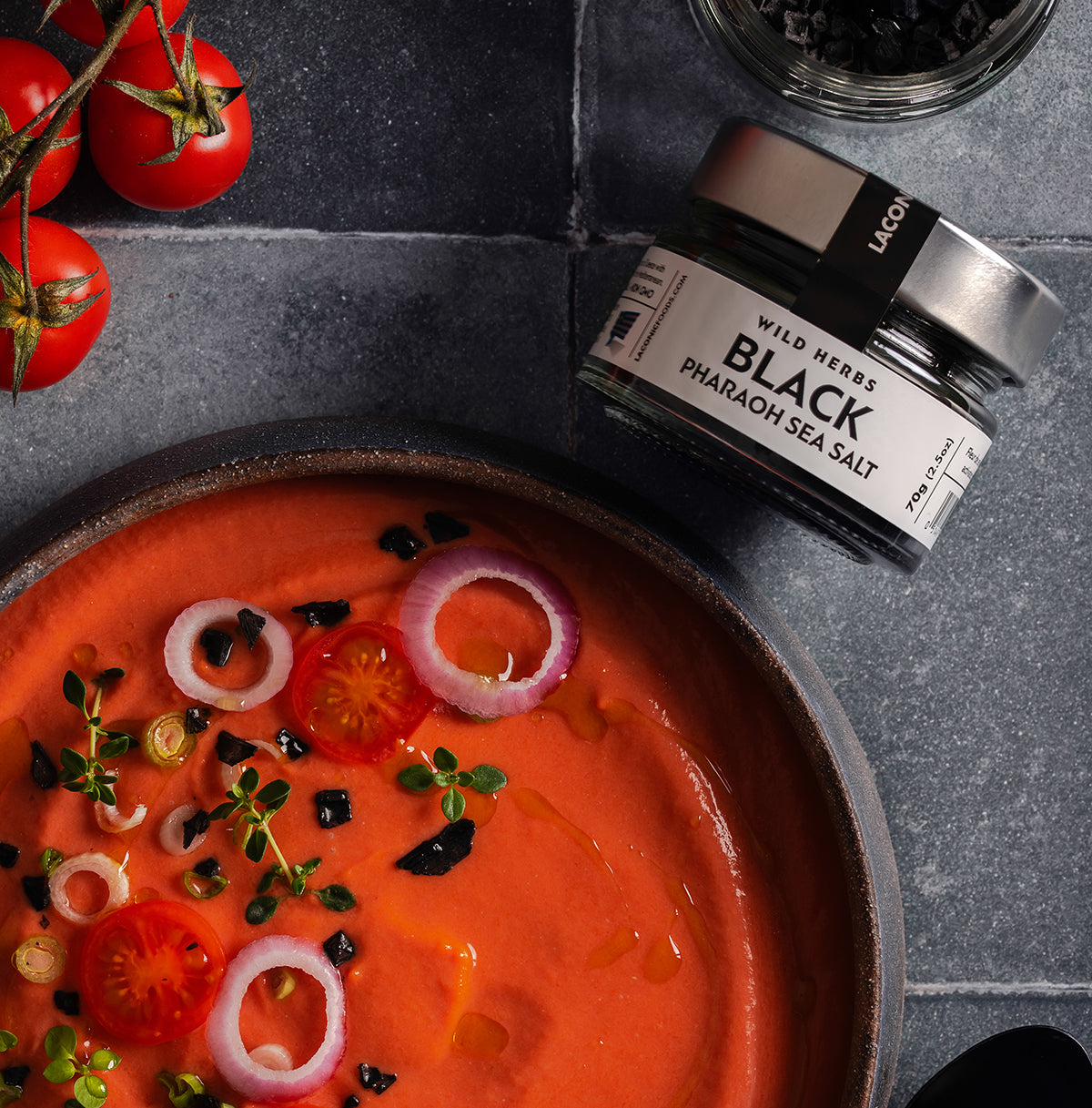 Laconic Foods Black Pharaoh Sea Salt used as finishing touch on gazpacho with tomatoes and onions