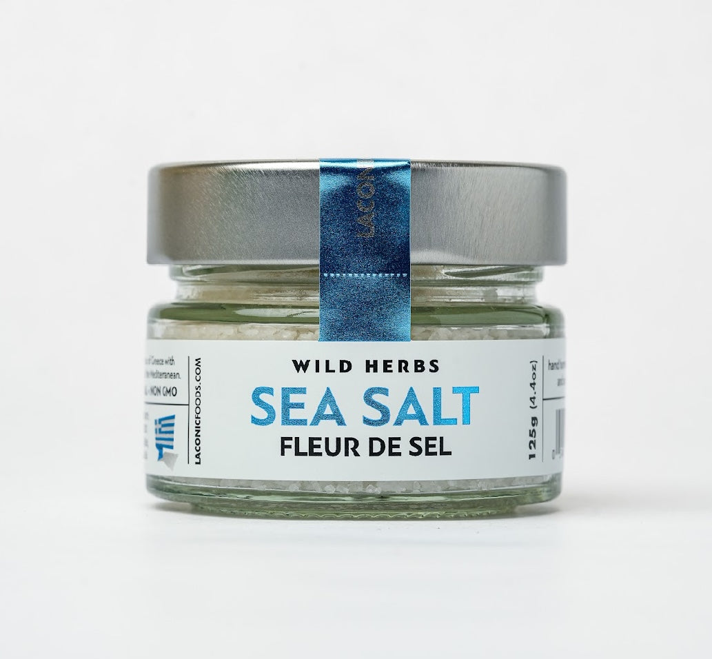 Front view of Laconic Foods Fleur de Sel Sea Salt in 125g glass jar with blue label