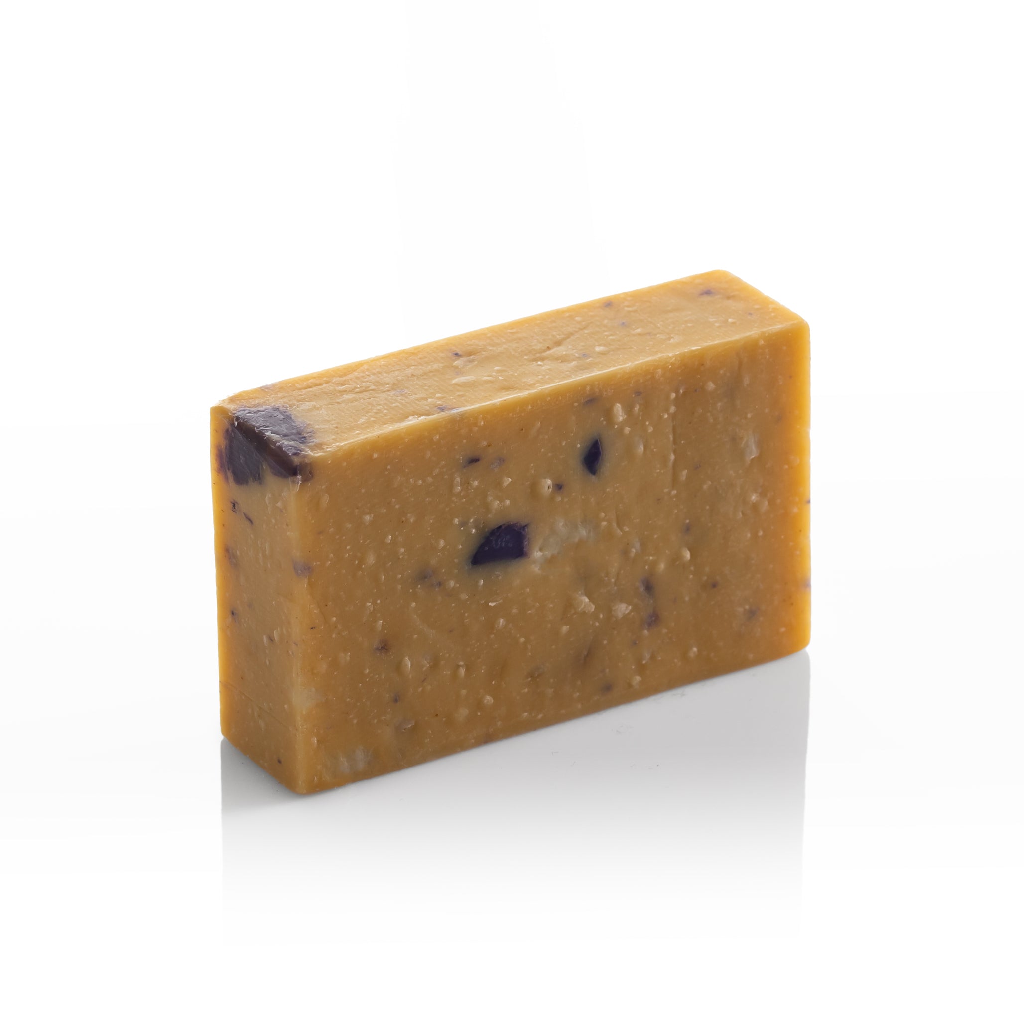 Greek Geranium Olive Oil Soap bar with natural golden color and botanical pieces