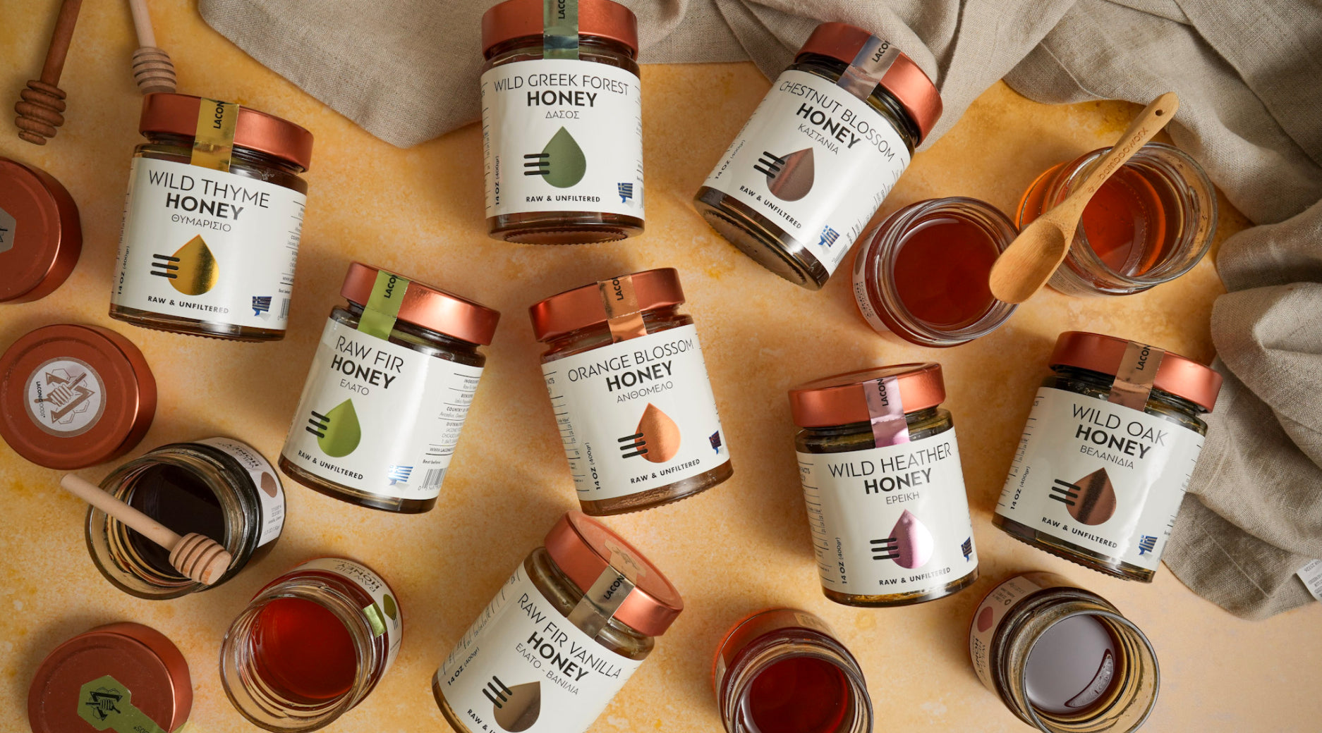 Laconic Foods — Greek Raw Honey collection featuring wild thyme, fir, orange blossom, wild oak, chestnut, forest, and heather honeys