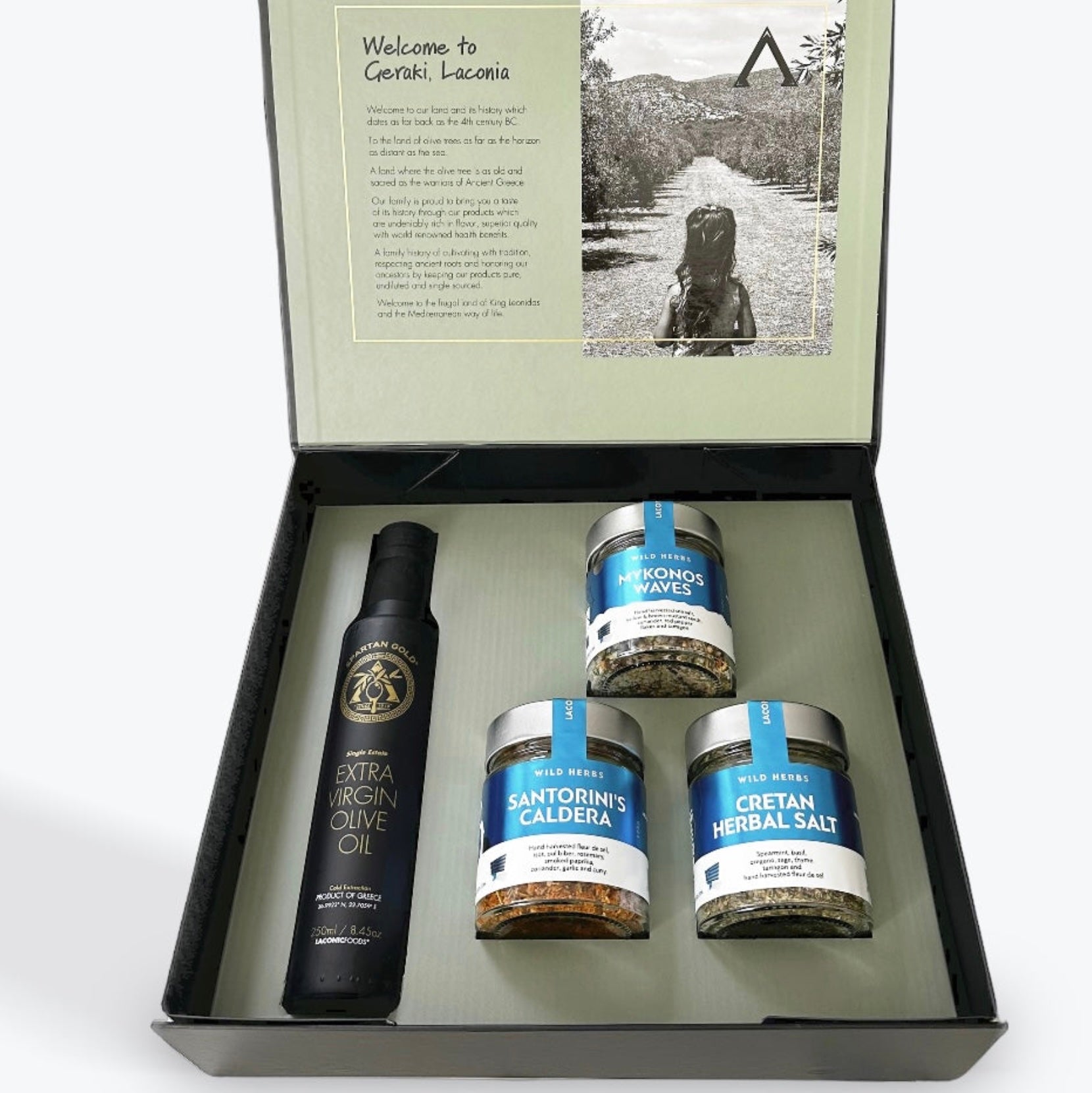 Laconic Foods gift box featuring EVOO and Mykonos, Santorini, and Cretan spice blends in display packaging