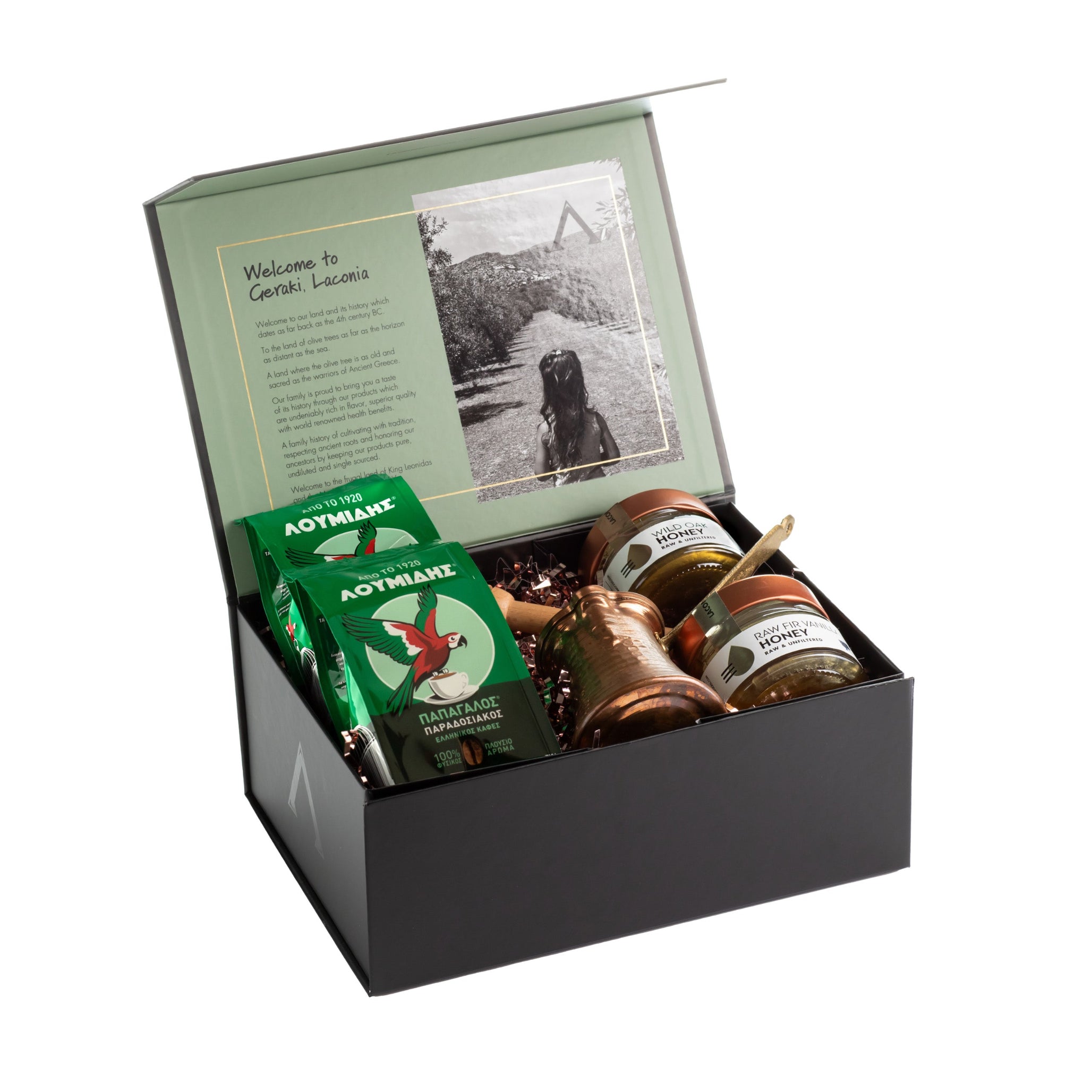 Laconic Foods Greek Coffee and Honey Gift Box open, featuring Loumidis coffee, raw Greek honey jars, copper briki, and printed story of Geraki, Laconia.
