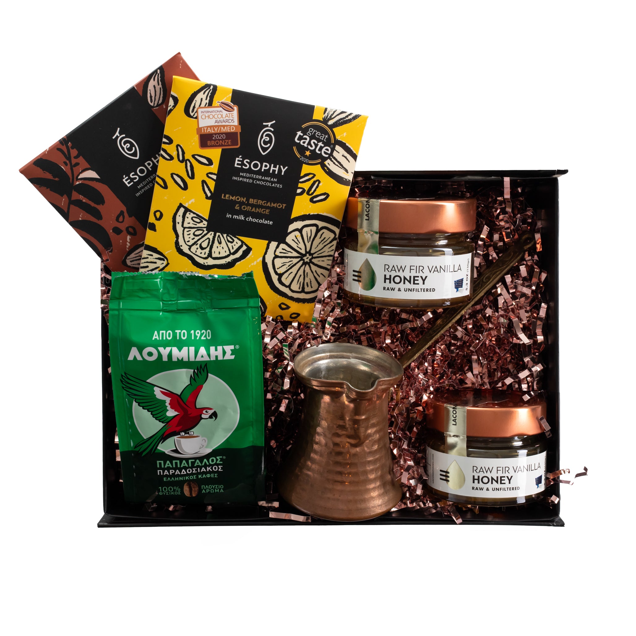 Top view of Laconic Foods Greek coffee gift box with Loumides coffee, raw Greek honey, handmade chocolates, briki pot, and honey dipper