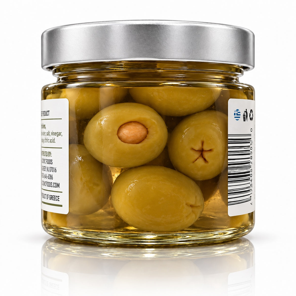 Close-up of Greek green olives stuffed with almonds in brine