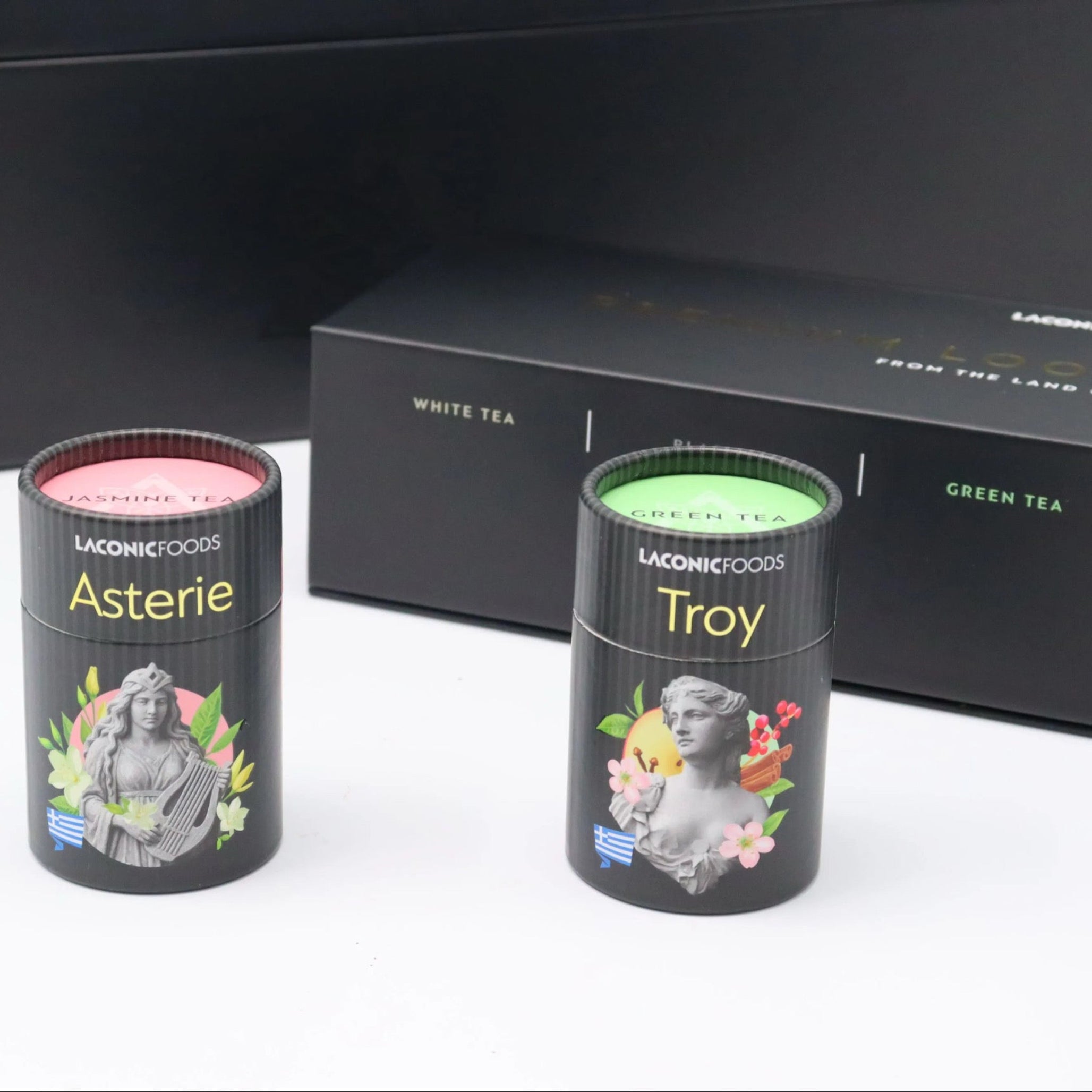 Laconic Foods Asterie and Troy loose leaf teas with tea leaves spilling from canister
