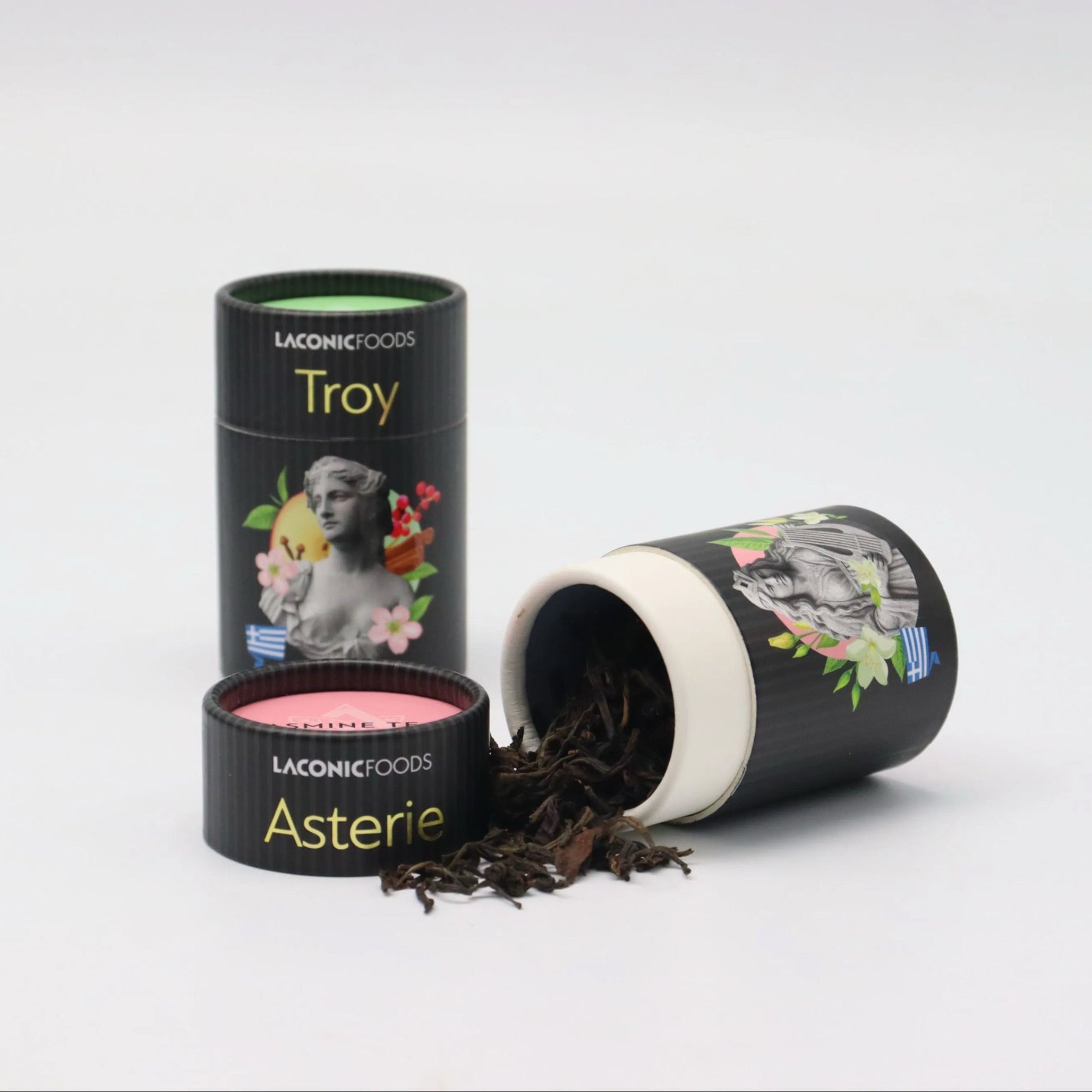 Laconic Foods Asterie and Troy loose leaf teas with tea leaves spilling from canister