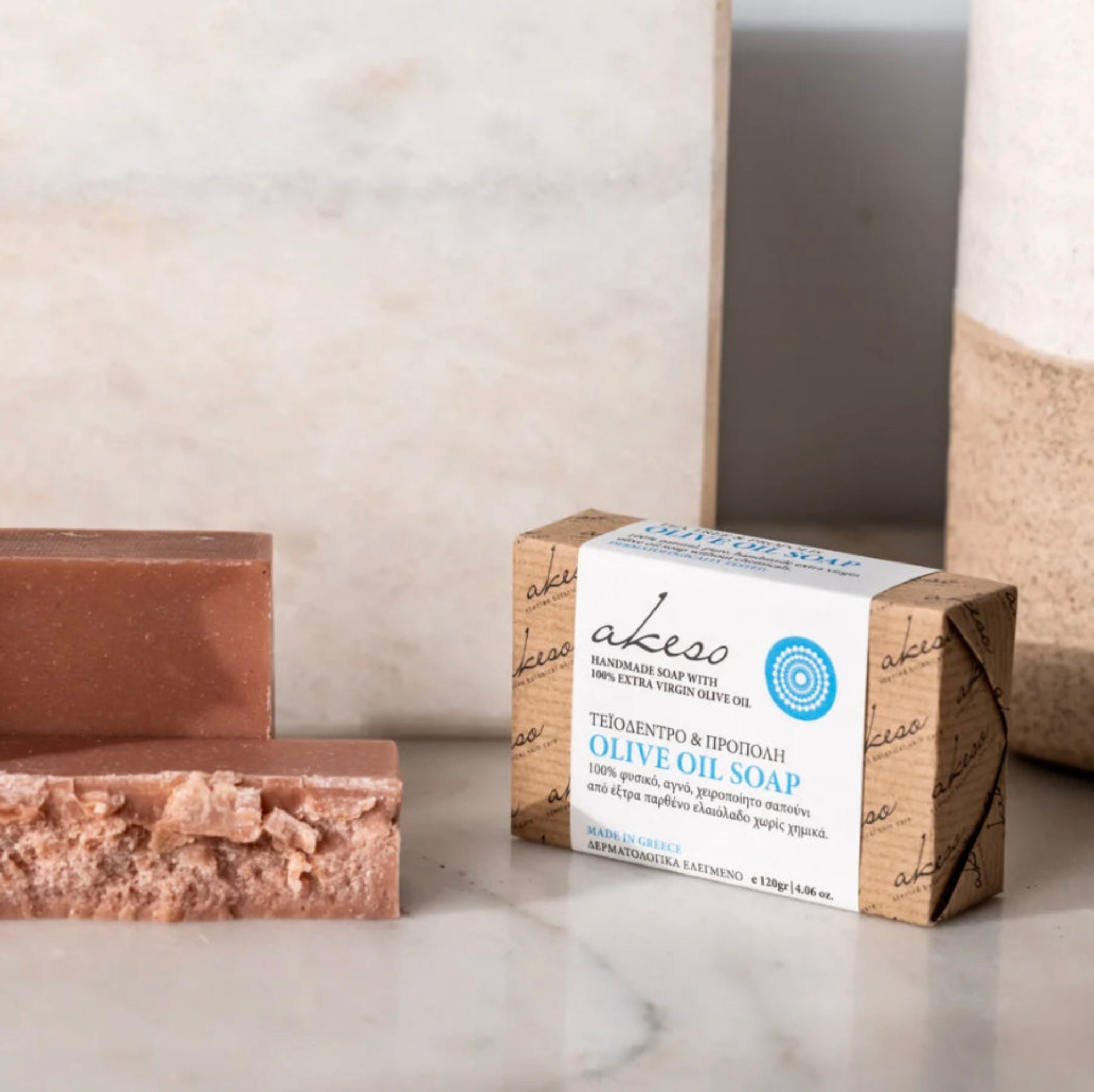 Handmade Greek olive oil soap with natural linen towel and packaged soap bar