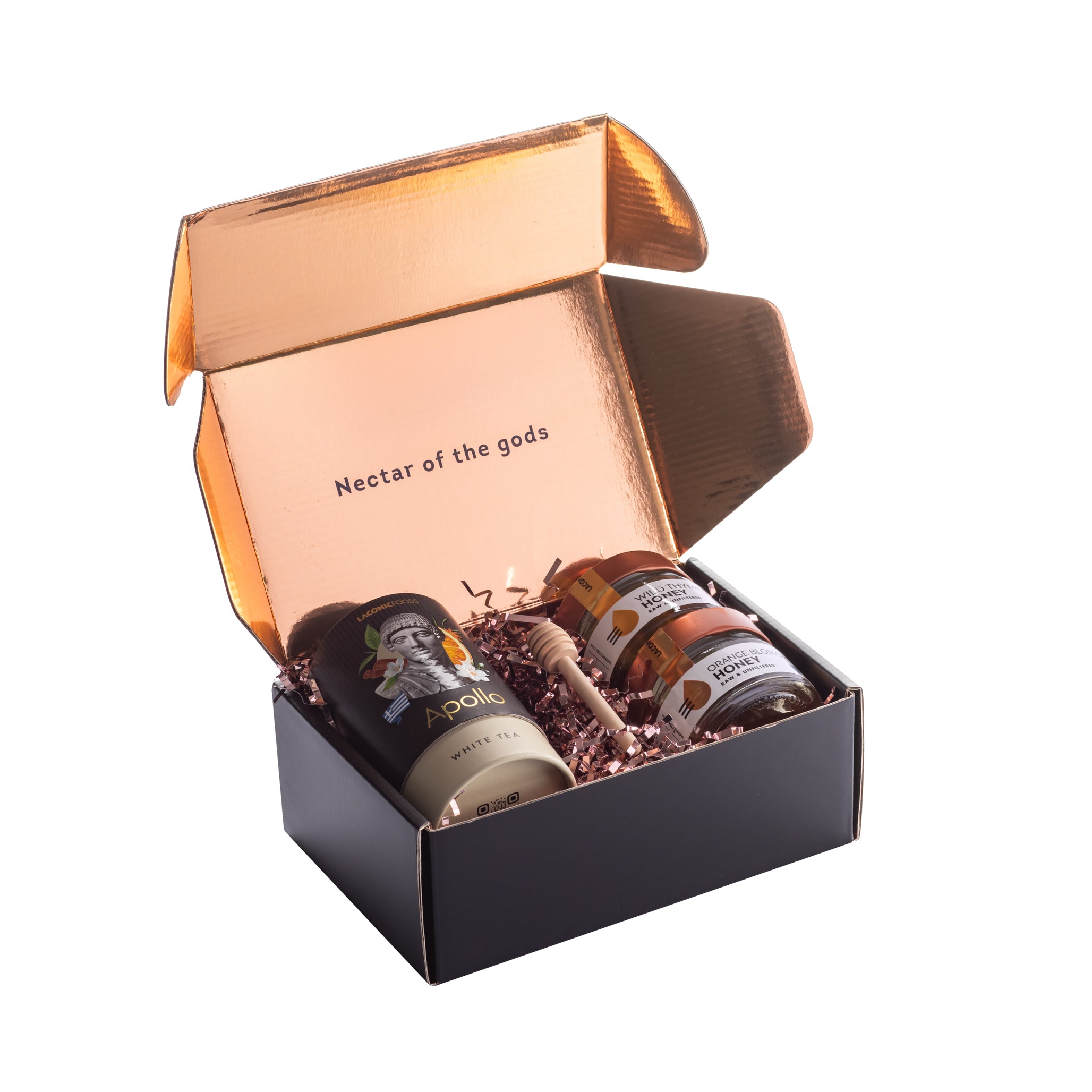 Open Laconic Foods Greek tea and honey gift box with Apollo white tea, two raw Greek honeys, honey dipper, and gold interior packaging