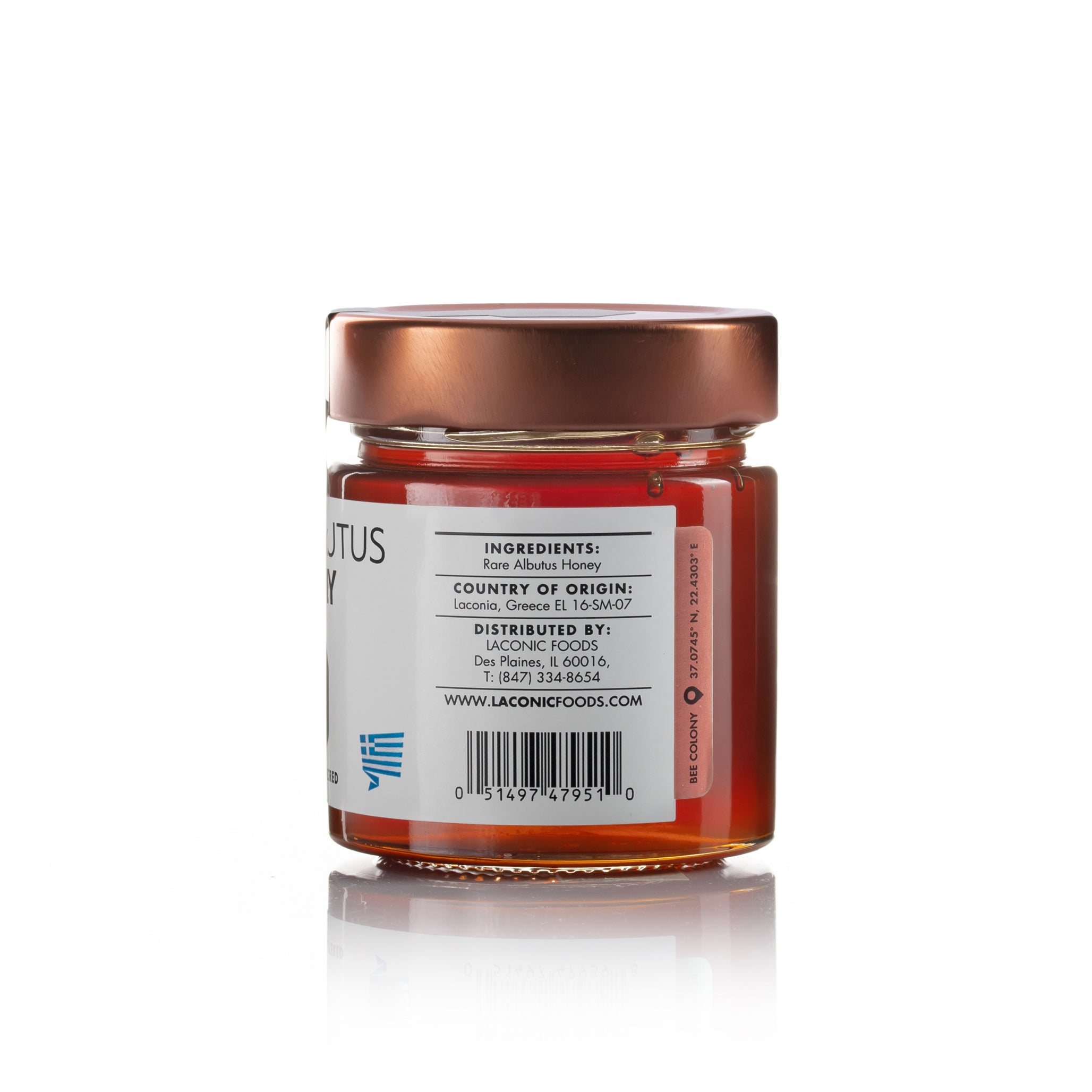 Back view of Laconic Foods Rare Arbutus Honey jar showing ingredients, origin from Laconia Greece, and distributor information.