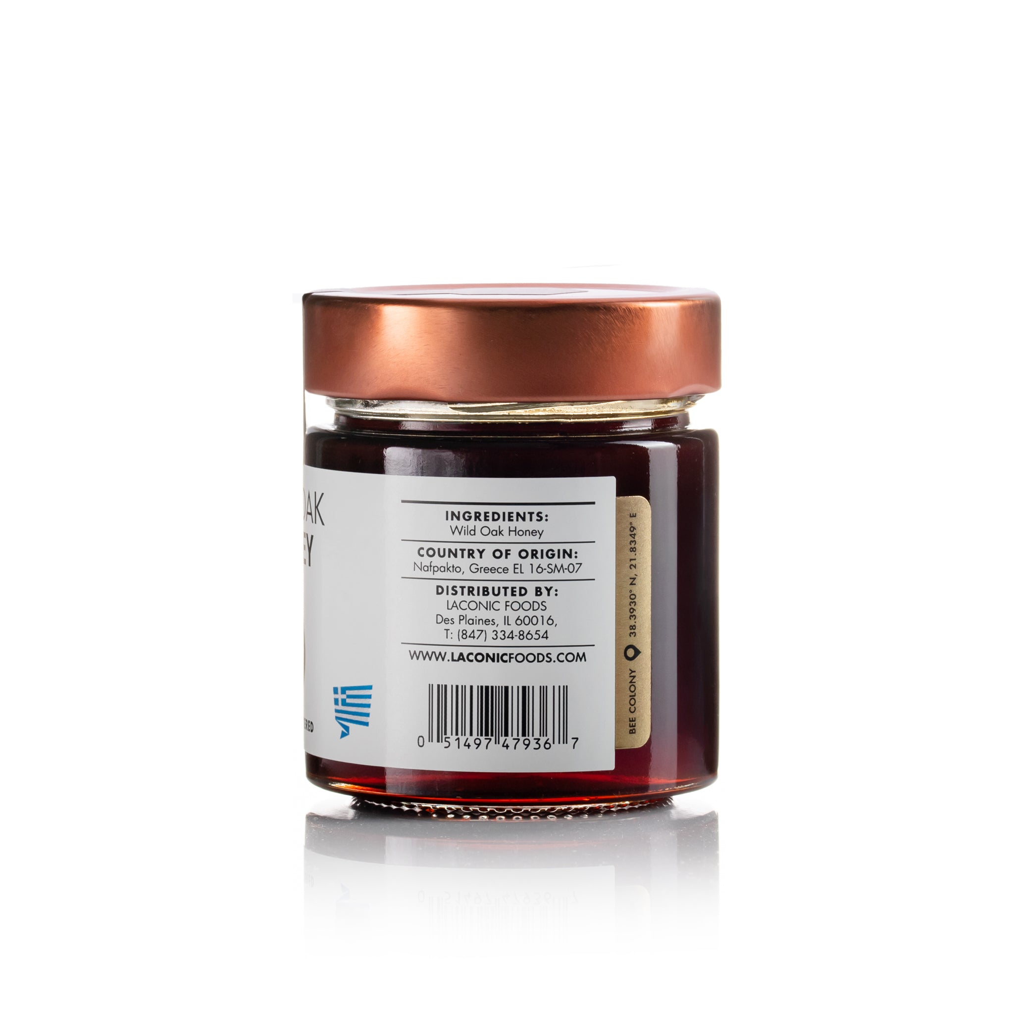 Back view of Laconic Foods Wild Oak Honey jar showing ingredients, origin from Nafpakto Greece, and distributor information.