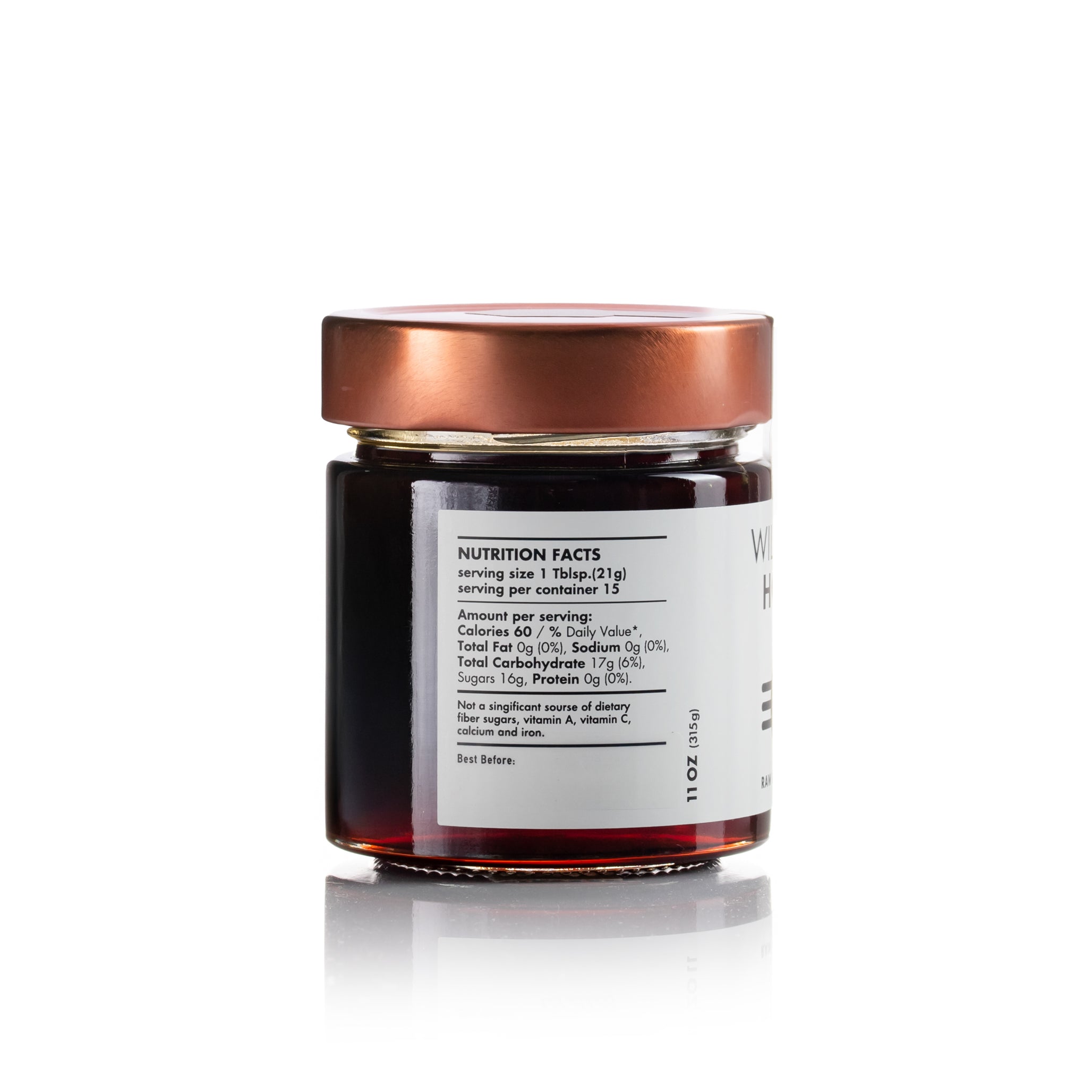 Side view of Laconic Foods Wild Oak Honey jar showing nutrition facts panel.